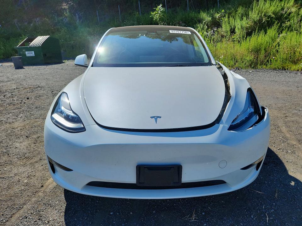Photo 5 from auction – 2023 TESLA MODEL Y with VIN 7SAYGDEE0PA109533