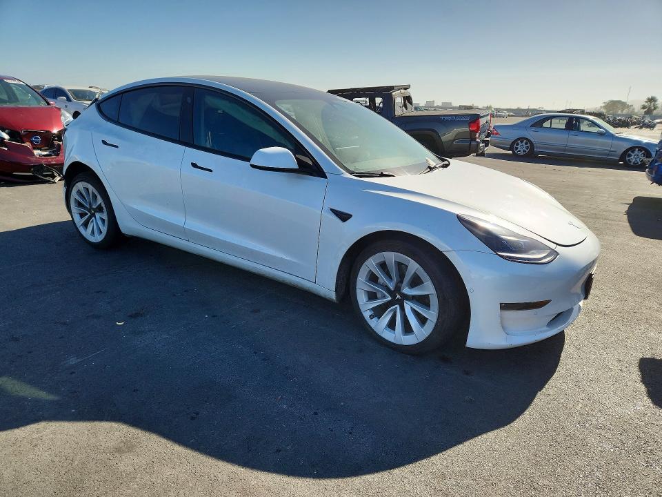 Photo 4 from auction – 2021 TESLA MODEL 3 with VIN 5YJ3E1EB4MF015414