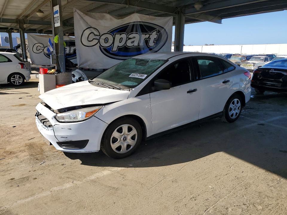 FORD FOCUS 2015 with VIN 1FADP3E26FL306643 - Photo from auction