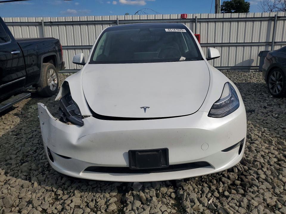Photo 5 from auction – 2023 TESLA MODEL Y with VIN 7SAYGDEE3PA115519