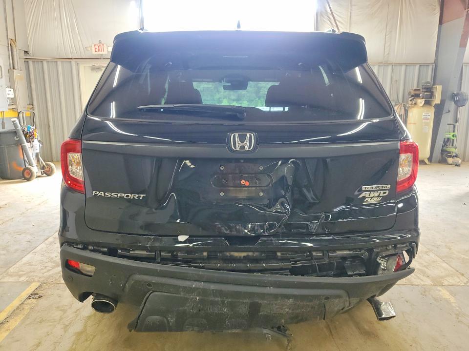 Photo 6 from auction – 2021 HONDA PASSPORT with VIN 5FNYF8H91MB017383