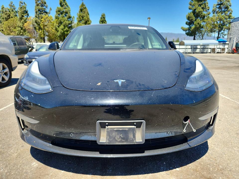 Снимка 5 от търг – 2022 TESLA MODEL 3 с VIN 5YJ3E1EA3NF124732