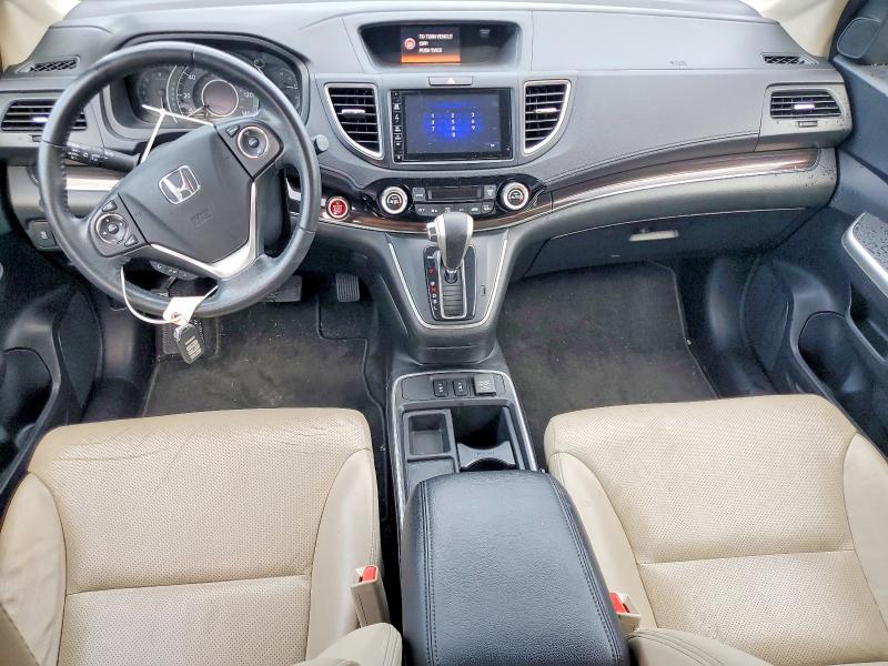 Photo 8 from auction – 2015 HONDA CR-V with VIN 5J6RM4H72FL034298