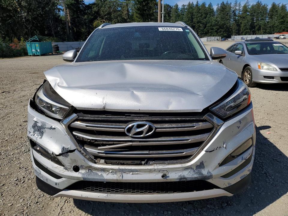 Photo 5 from auction – 2017 HYUNDAI TUCSON with VIN KM8J3CA29HU400409