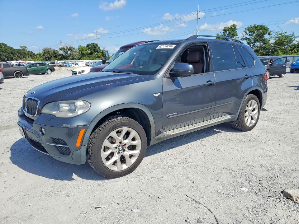 BMW X5 2013 with VIN 5UXZV4C5XD0B04705 - Photo from auction