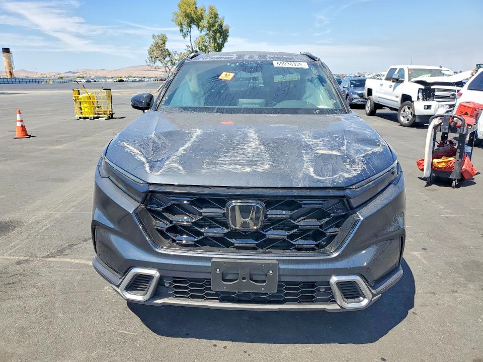 Photo 5 from auction – 2025 HONDA CR-V with VIN 7FARS6H97SE105201