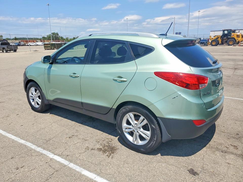 Photo 2 from auction – 2013 HYUNDAI TUCSON with VIN KM8JUCAC9DU685970