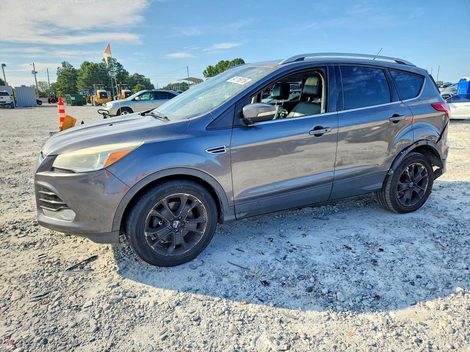 FORD ESCAPE 2018 with VIN 1FMCU9J90EUC86608 - Photo from auction