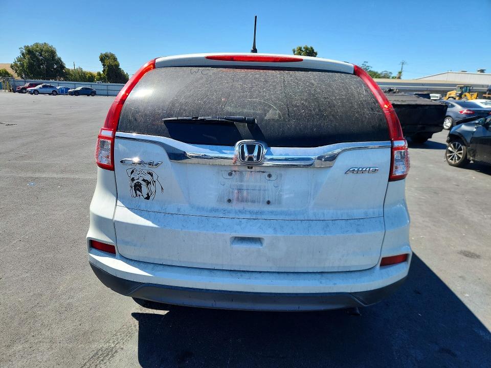 Photo 6 from auction – 2015 HONDA CR-V with VIN 5J6RM4H35FL024572