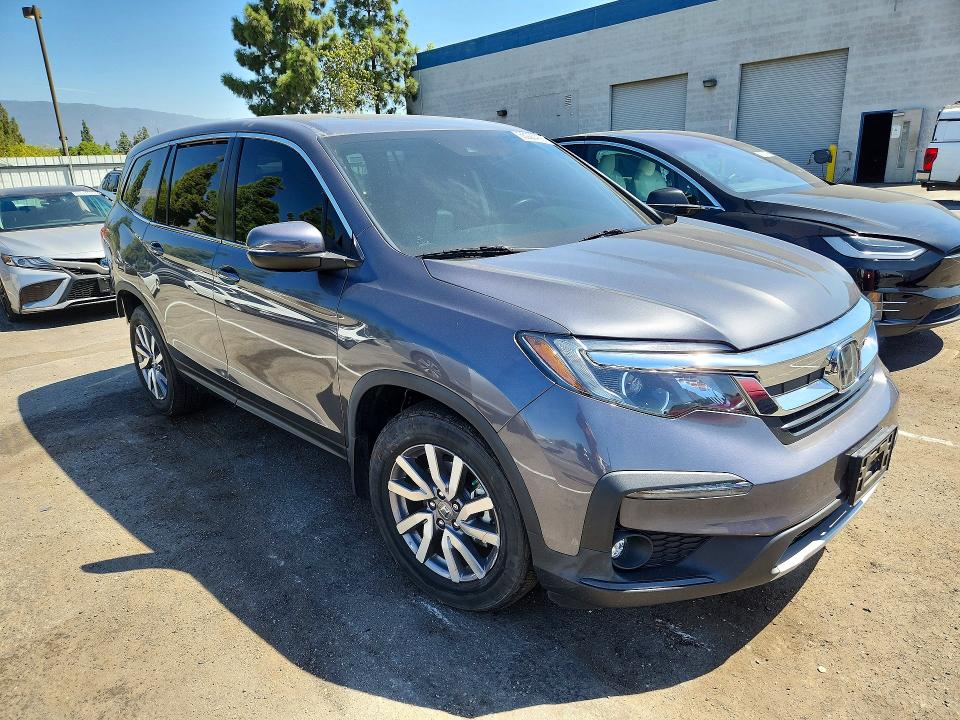 Photo 4 from auction – 2022 HONDA PILOT with VIN 5FNYF5H51NB037775