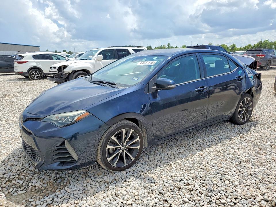 TOYOTA COROLLA 2018 with VIN 5YFBURHE6JP780756 - Photo from auction