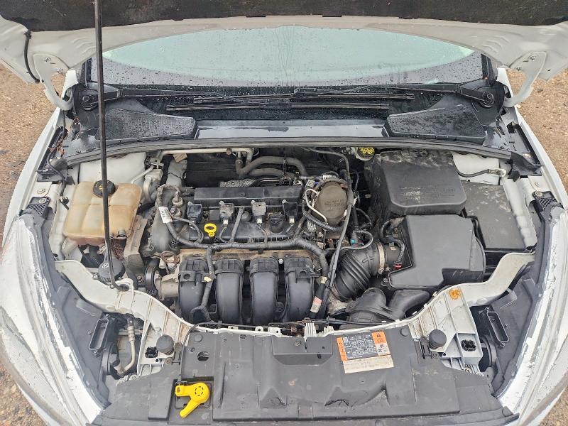 Photo 11 from auction – 2015 FORD FOCUS with VIN 1FADP3F28FL336791