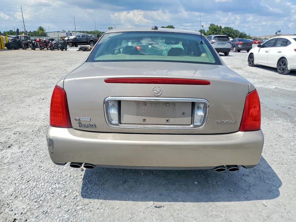 Photo 6 from auction – 2004 CADILLAC DEVILLE with VIN 1G6KD54Y84U152393