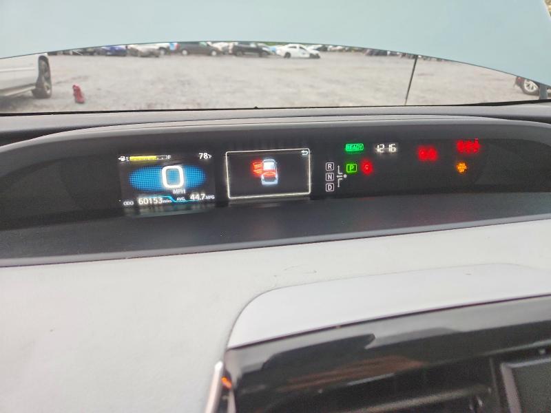 Photo 9 from auction – 2021 TOYOTA PRIUS with VIN JTDKAMFU2M3134746