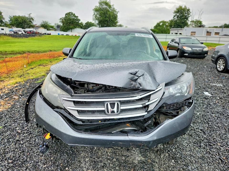 Photo 5 from auction – 2013 HONDA CR-V with VIN 2HKRM4H70DH605374