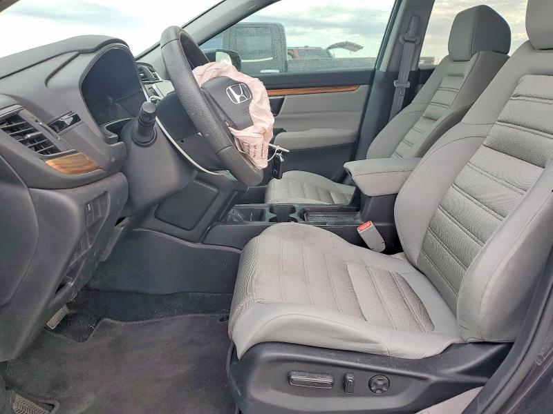 Photo 7 from auction – 2018 HONDA CR-V with VIN 7FARW1H52JE026358