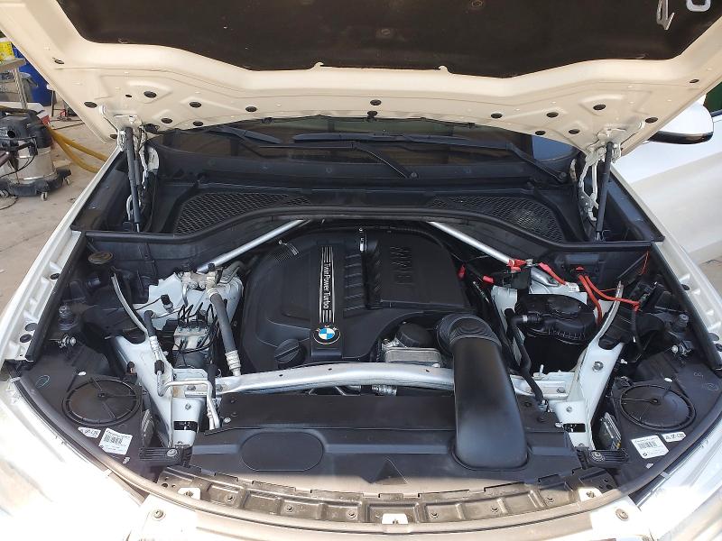 Photo 11 from auction – 2014 BMW X5 with VIN 5UXKR2C50E0C00239
