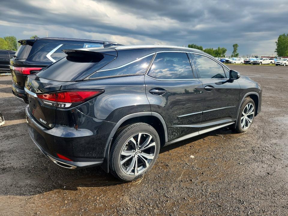 Photo 3 from auction – 2022 LEXUS RX with VIN 2T2JZMDA7NC317495