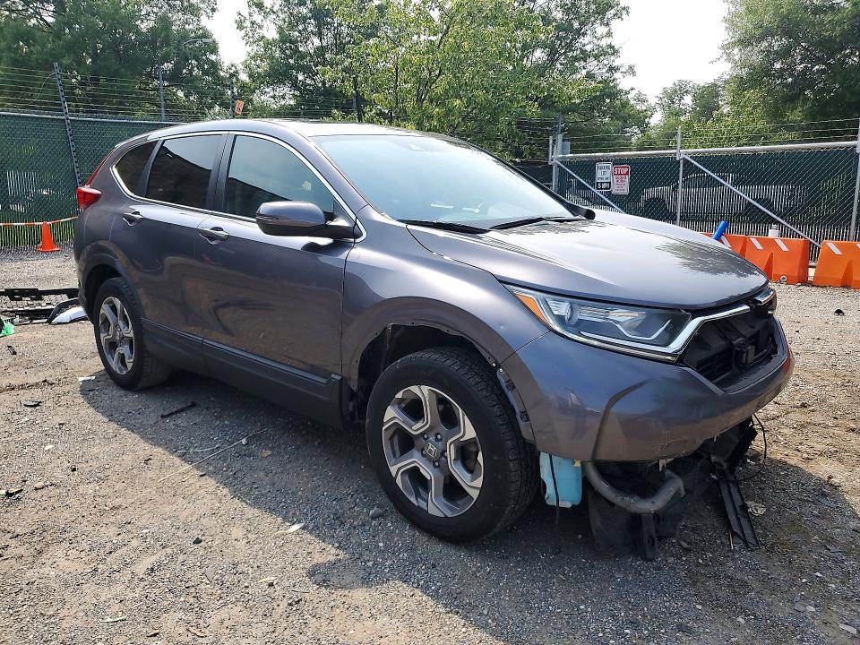 Photo 4 from auction – 2019 HONDA CR-V with VIN 7FARW2H54KE062740