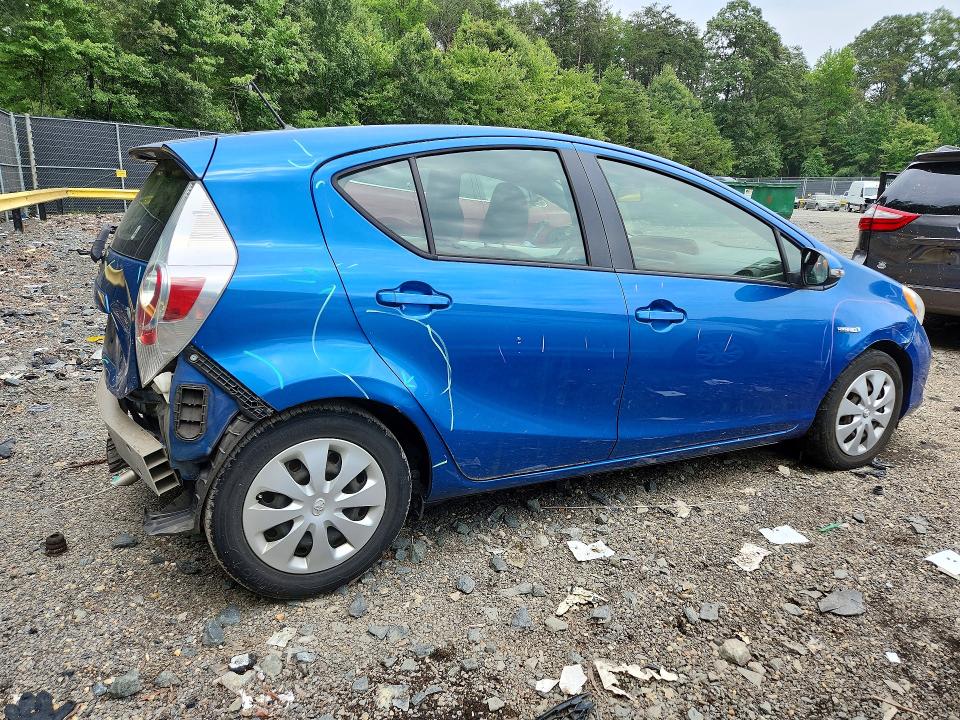 Photo 3 from auction – 2014 TOYOTA PRIUS C with VIN JTDKDTB3XE1572202