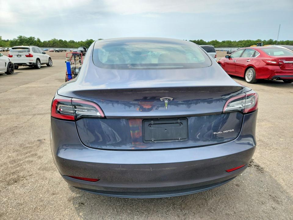 Photo 6 from auction – 2021 TESLA MODEL 3 with VIN 5YJ3E1EB0MF975071
