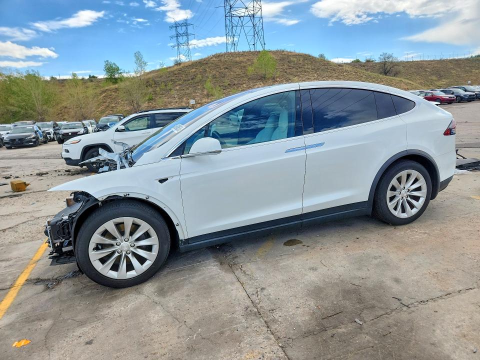 TESLA MODEL X 2018 with VIN 5YJXCDE21JF112039 - Photo from auction