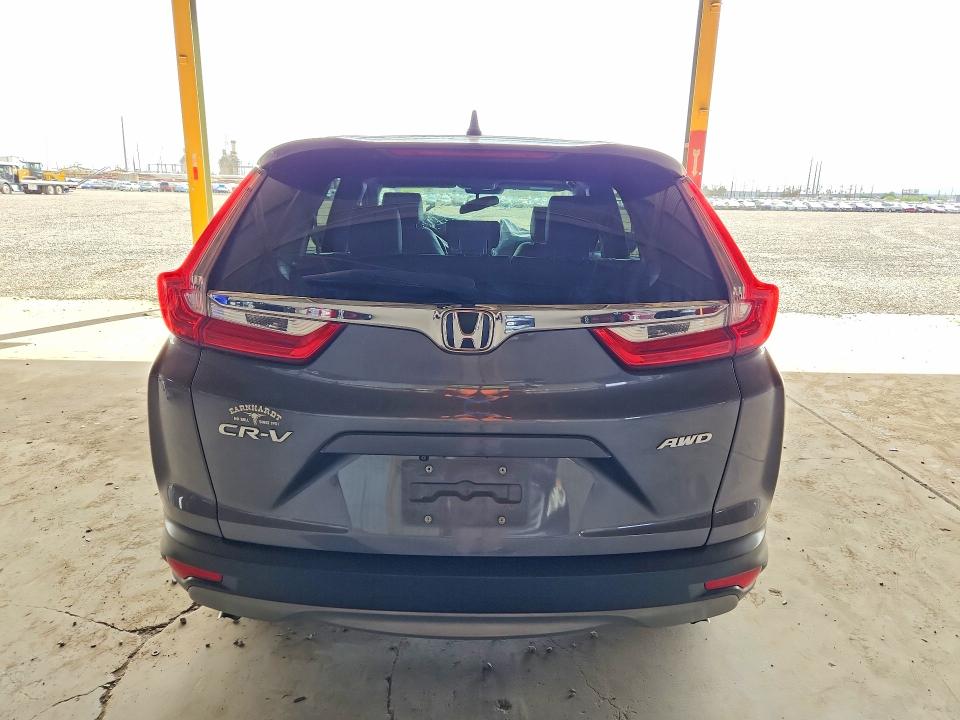 Photo 6 from auction – 2019 HONDA CR-V with VIN JHLRW2H83KX003533