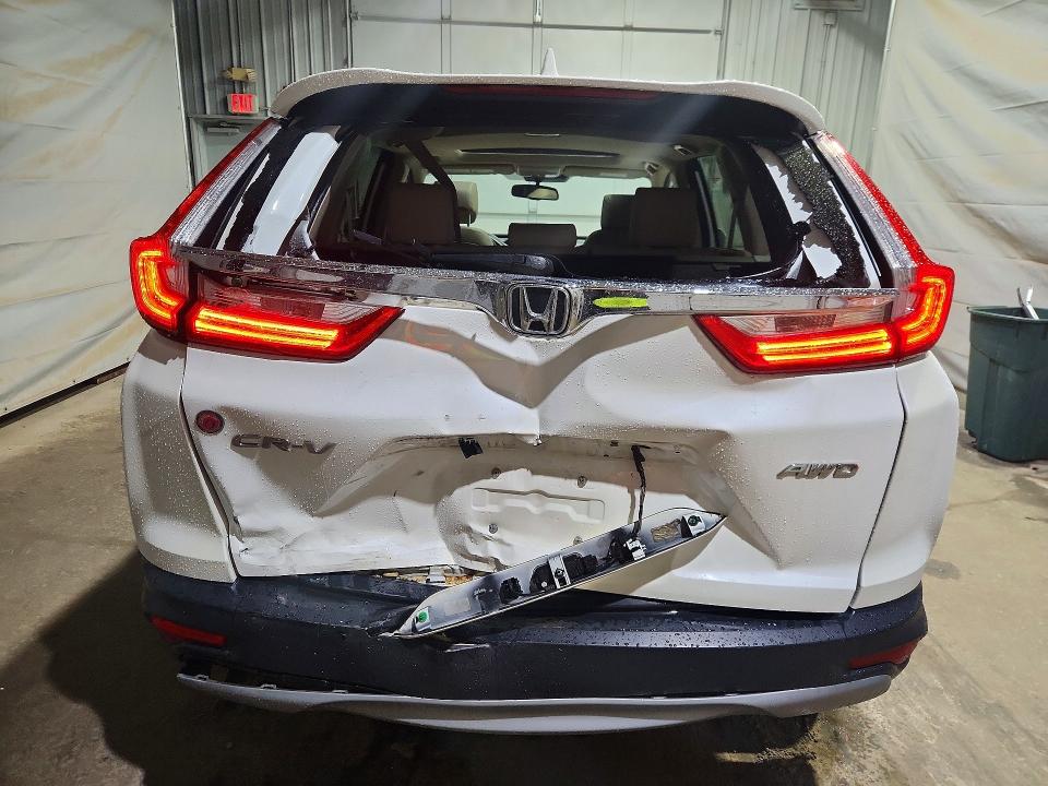 Photo 6 from auction – 2017 HONDA CR-V with VIN 5J6RW2H8XHL060982