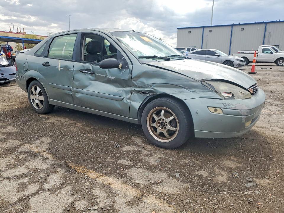 Photo 4 from auction – 2003 FORD FOCUS with VIN 1FAFP38373W336337