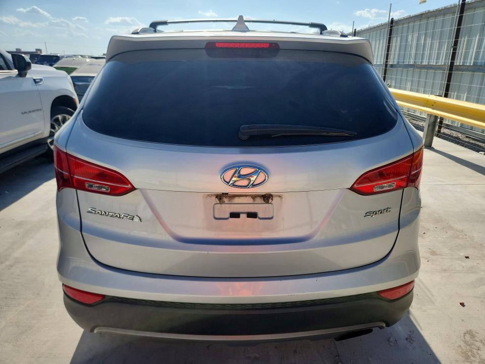 Снимка 6 от търг – 2014 HYUNDAI SANTA FE SPORT с VIN 5XYZU3LB3EG212600