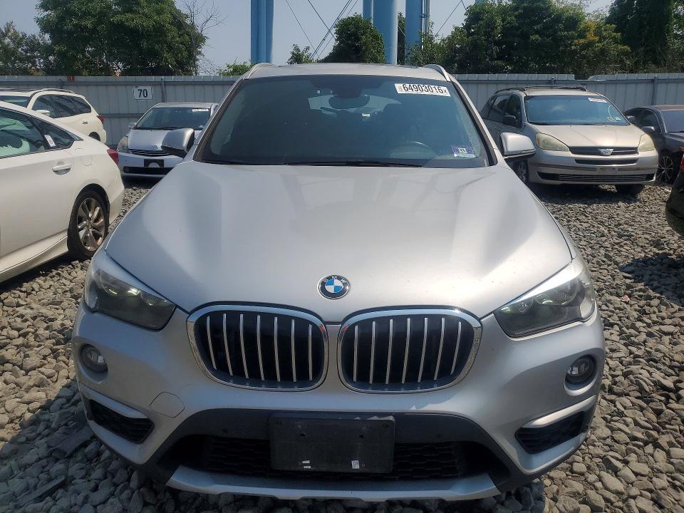 Photo 5 from auction – 2017 BMW X1 with VIN WBXHT3C36H5F70042