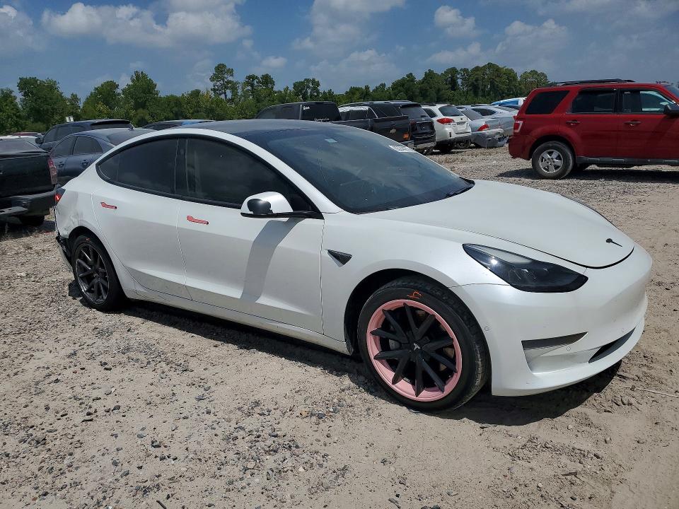 Photo 4 from auction – 2021 TESLA MODEL 3 with VIN 5YJ3E1EA6MF994909