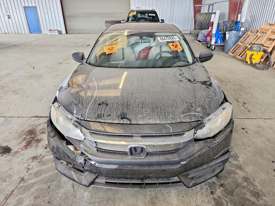 Photo 5 from auction – 2016 HONDA CIVIC with VIN 19XFC2F50GE225262