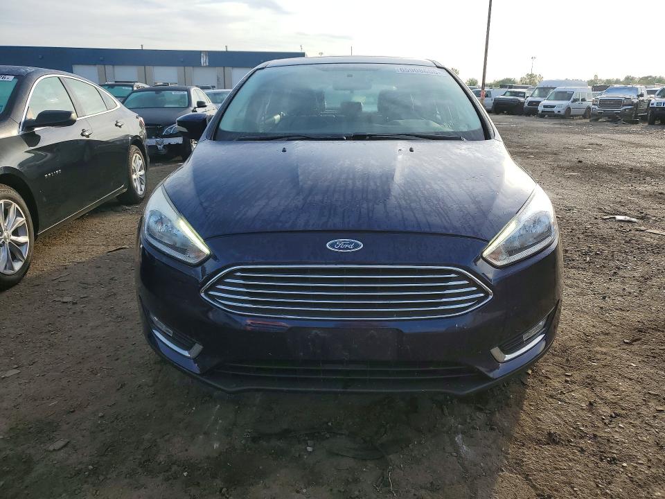 Photo 5 from auction – 2017 FORD FOCUS with VIN 1FADP3N23HL333995
