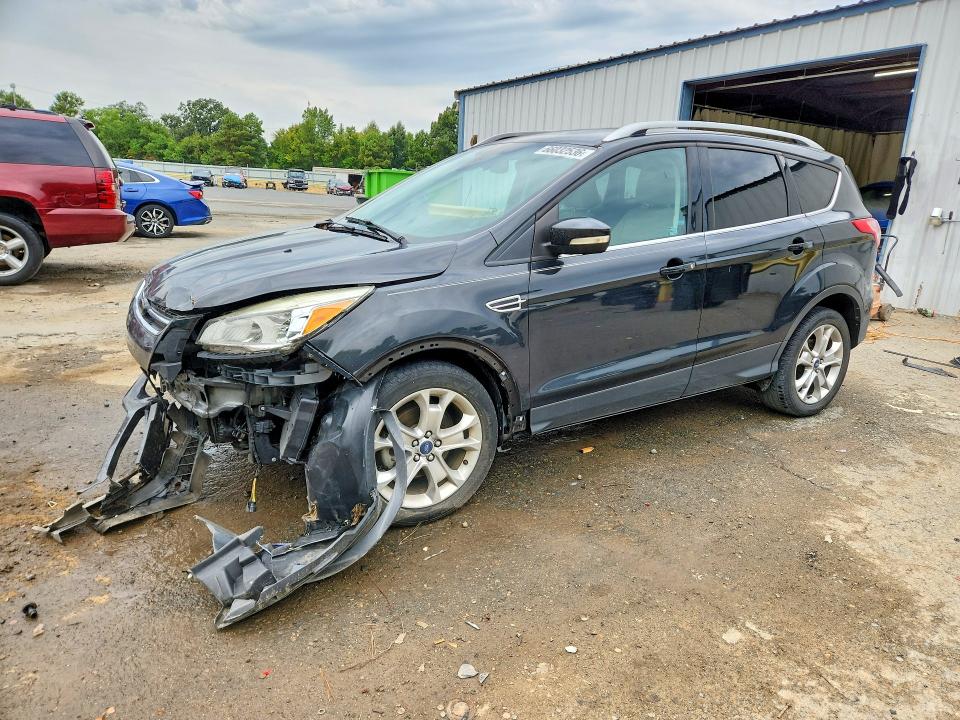 FORD ESCAPE 2014 with VIN 1FMCU0JX5EUC89904 - Photo from auction