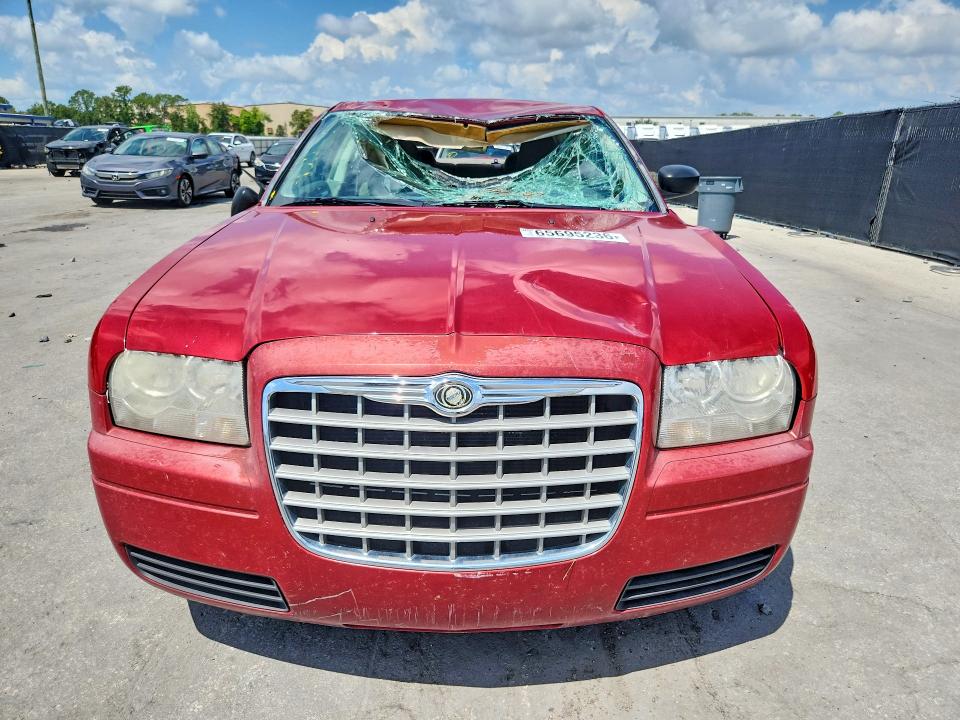 Photo 5 from auction – 2009 CHRYSLER 300 with VIN 2C3KA43D89H574760