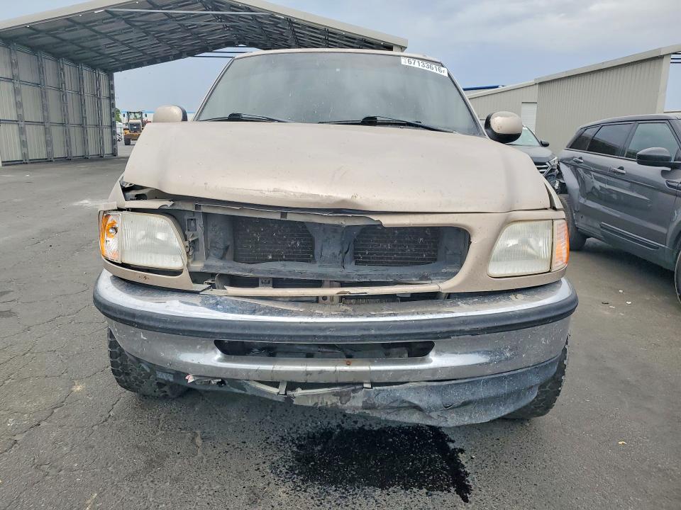 Photo 5 from auction – 1998 FORD F150 with VIN 1FTRX17L1WKB78165