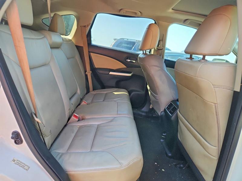 Photo 11 from auction – 2015 HONDA CR-V with VIN 5J6RM3H79FL010381