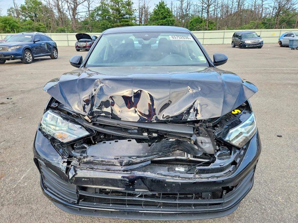 Photo 5 from auction – 2023 VOLKSWAGEN JETTA with VIN 3VW7M7BU3PM035499