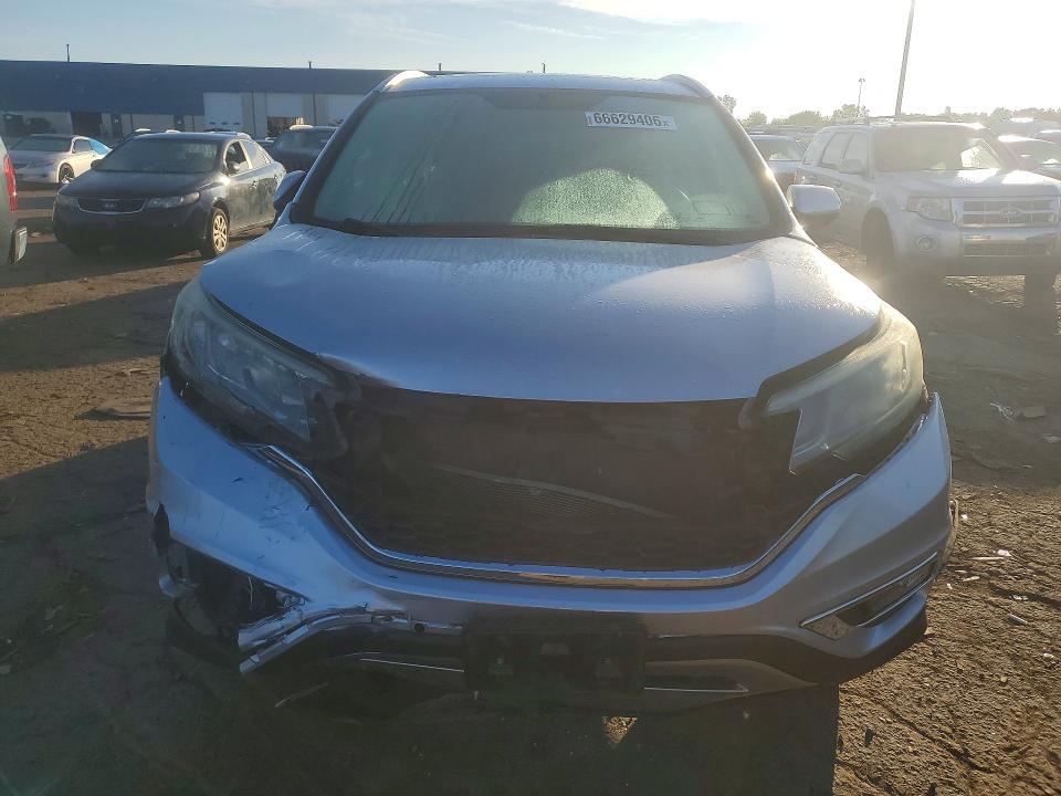 Photo 5 from auction – 2016 HONDA CR-V with VIN 2HKRM4H72GH662891