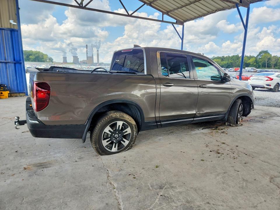 Photo 3 from auction – 2020 HONDA RIDGELINE with VIN 5FPYK3F58LB017742