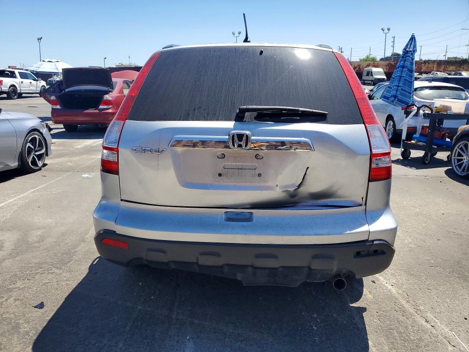 Photo 6 from auction – 2009 HONDA CR-V with VIN JHLRE38549C014251