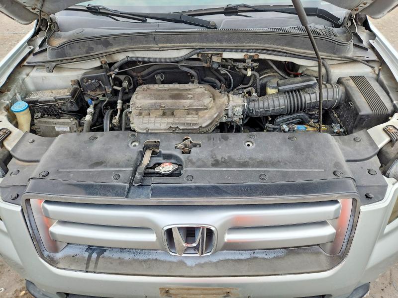 Photo 12 from auction – 2006 HONDA PILOT with VIN 2HKYF18146H504244