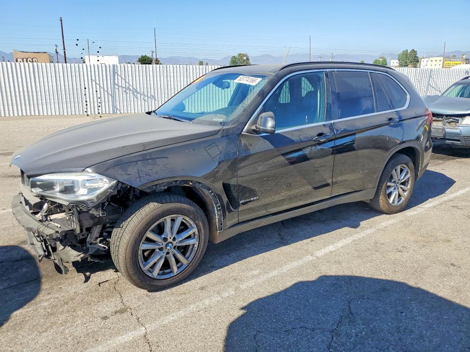 BMW X5 2014 with VIN 5UXKR2C52E0H32012 - Photo from auction