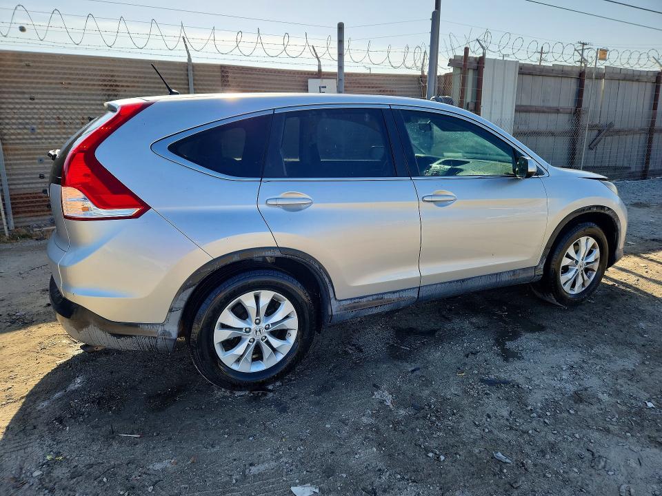 Photo 3 from auction – 2012 HONDA CR-V with VIN JHLRM3H57CC008079