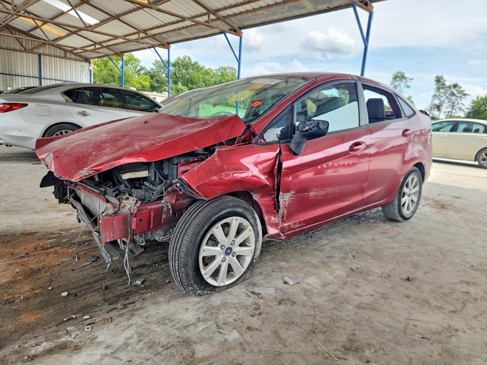 FORD FIESTA 2011 with VIN 3FADP4BJ8BM124548 - Photo from auction