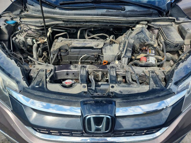 Photo 11 from auction – 2015 HONDA CR-V with VIN 5J6RM4H91FL090122