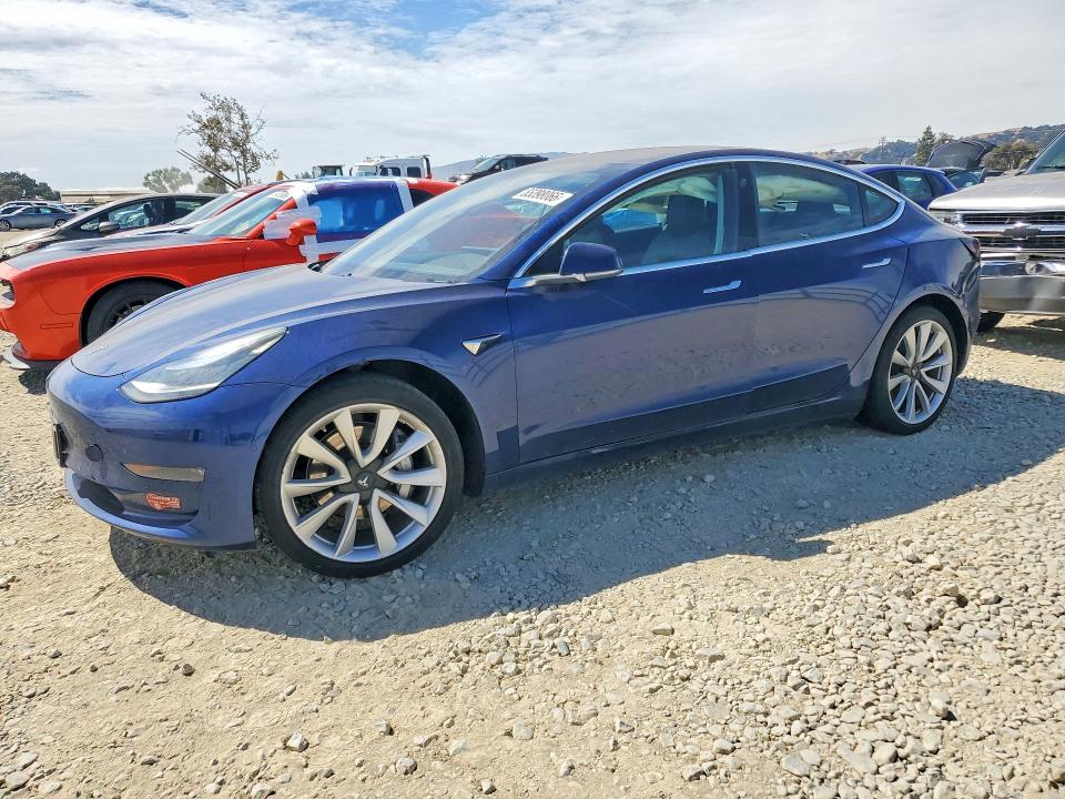TESLA MODEL 3 2018 with VIN 5YJ3E1EA9JF040392 - Photo from auction