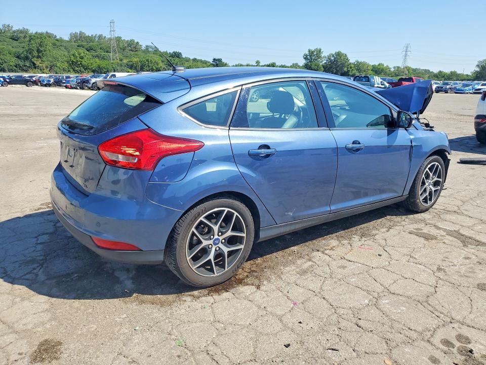 Photo 3 from auction – 2018 FORD FOCUS with VIN 1FADP3M28JL243975