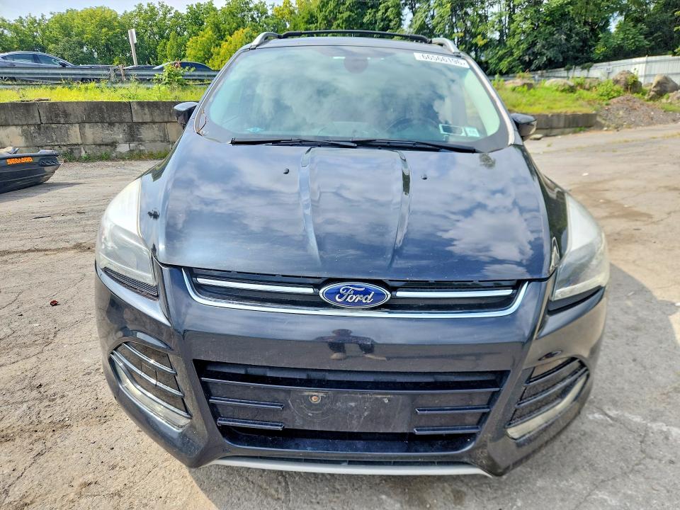 Photo 5 from auction – 2014 FORD ESCAPE with VIN 1FMCU9J92EUC80549